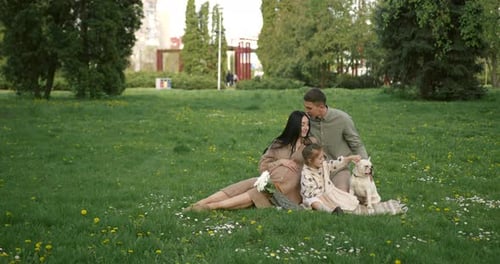 Loving Family Enjoying a Picnic in the Park