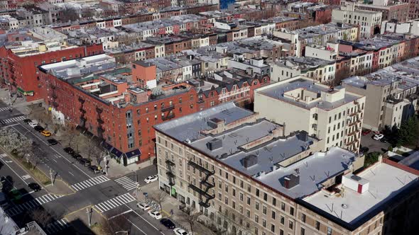 Aerial tilt up reveals epic vista of Harlem New York City rooftops ...