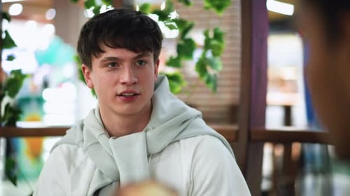 White Guy Giving Questioning Look to Friend