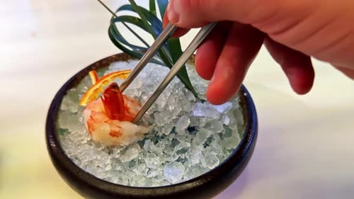 Exquisite Shrimp Served on Ice with Chopsticks