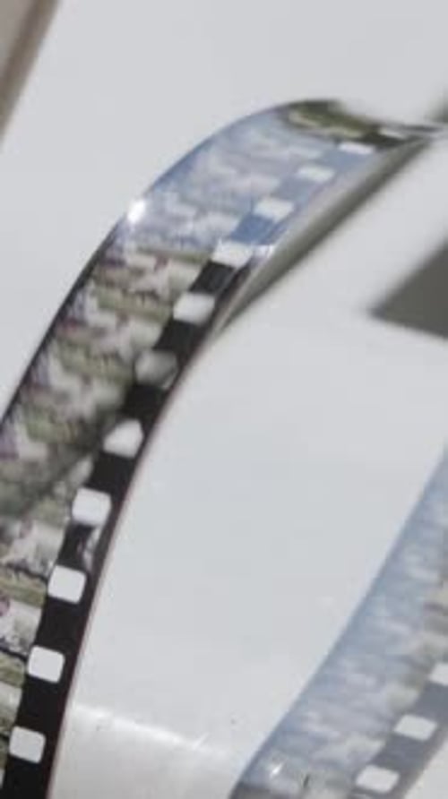 Strip of vintage 35mm film on white surface