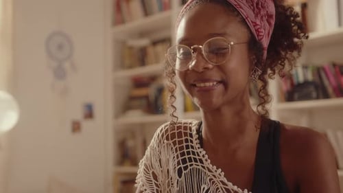 Smiling Woman on Video Call Indoors