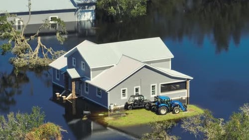 Surrounded By Hurricane Ian Rainfall Flood Waters Home in Florida Residential Area