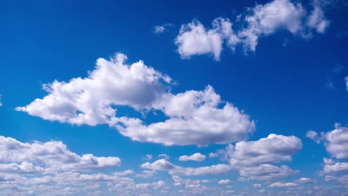 Timelapse of Cumulus Clouds Moves In The Blue Sky