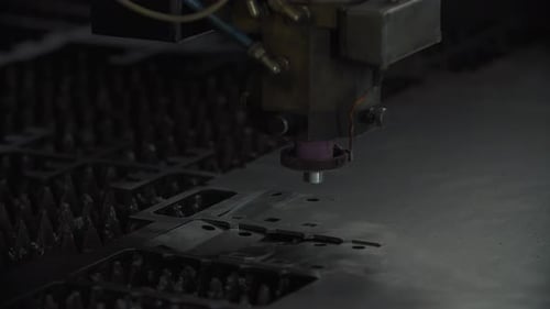 Laser Cutting Metal Sheet with Bright Sparkles