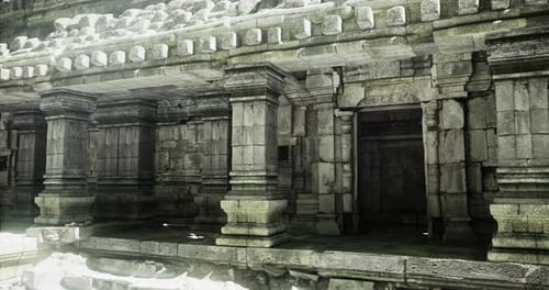 Ancient Temple Architecture Showcasing Intricate Stone Carvings and Pillars
