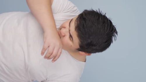 Vertical Video of The sneezing boy. Patient.