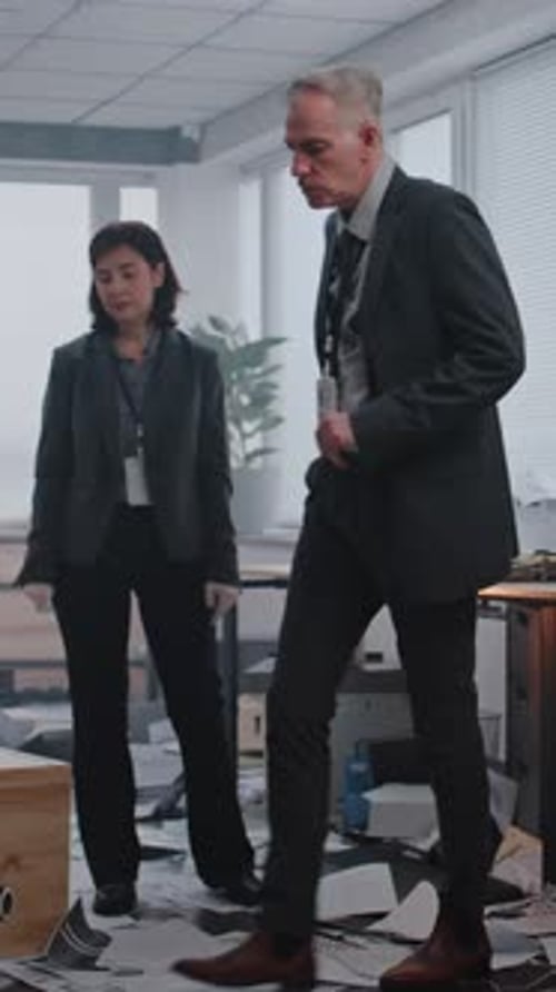 Disheveled Office After Crime With Two People