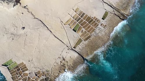Aerial view of Salt Pans near ocean, Malta.