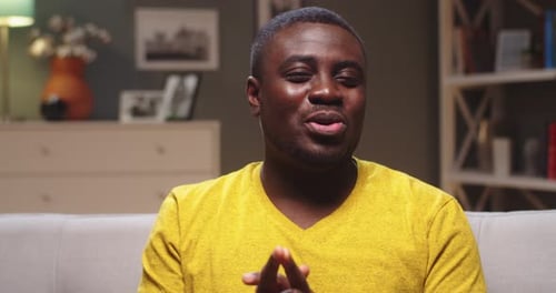 Man Talking to Camera Indoors