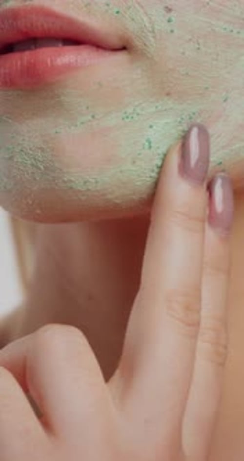Hands, skincare and woman in studio with face mask for facial treatment, hydration and wellness