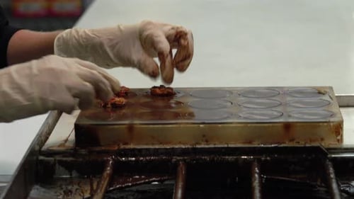 Making Candies in a Chocolate Mold at Work