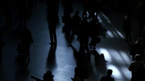 Pedestrians Commuting on Crowded Street in Rush Hour Traffic