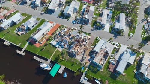 Severely Damaged Houses After Hurricane Ian in Florida Mobile Home Residential Area Consequences of