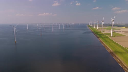 Majestic Wind Turbines Harnessing Energy in the Serene Waters of the Netherlands