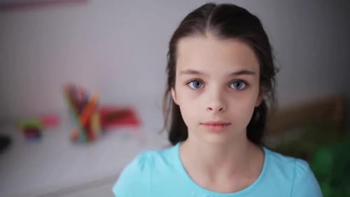 Smiling Girl Portrait in Home Interior Setting