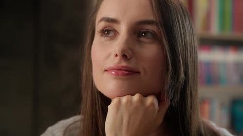 Thoughtful Caucasian Woman Smiling Thinking Idea in Library Indoor Female Student Businesswoman