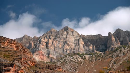 Mountain Scenery Exploration Bright Peaks With Rugged Rocks Geologist Examines Rocky Outcrop In