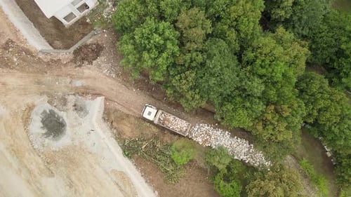 Aerial View of a Truck Delivering Rocks