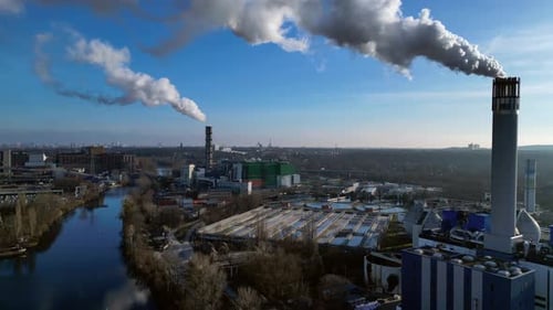 Waste energy plant factory with smoke chimney. Fabulous aerial view flight drone