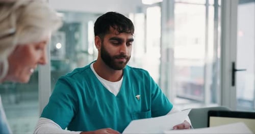 Data, documents and healthcare with people in boardroom of hospital for meeting