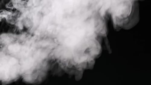 White Smoke Puff on Black Background