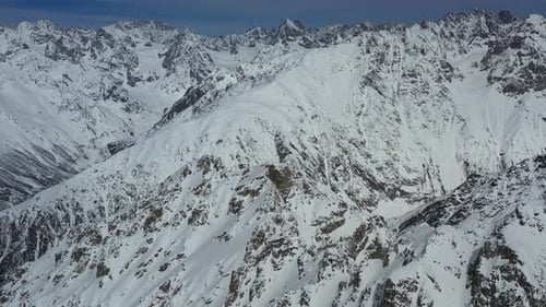 Majestic Snow-Capped Mountains Aerial View in Winter