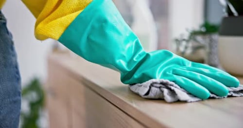 Gloved Hand Wipes Surface Clean With Rag