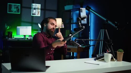 Influencer Doing Peace Sign in Front on Cellphone Attached to Selfie Stick