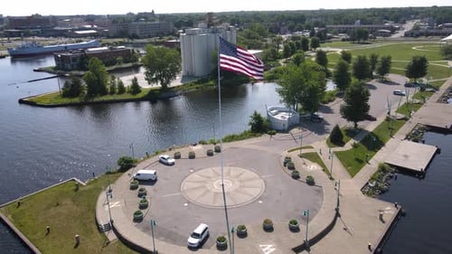 Aerial View of City Harbor With American Flag