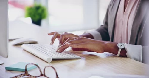 4k video footage of an unrecognizable businesswoman working in her office