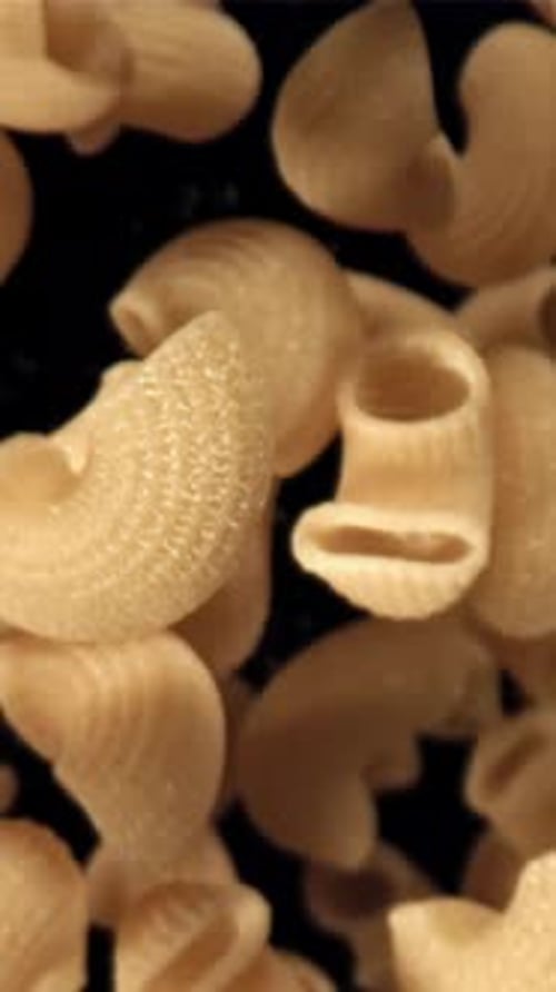 The Dry Pasta Flies Up and Falls Down Filmed on a Highspeed Camera at 1000 Fps