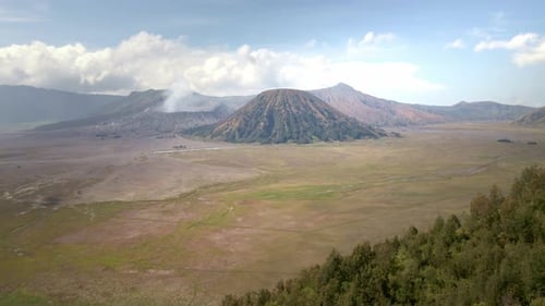 the rustic charm of the rugged valley and iconic Mount Bromo, an active volcano in Indonesia. Breath