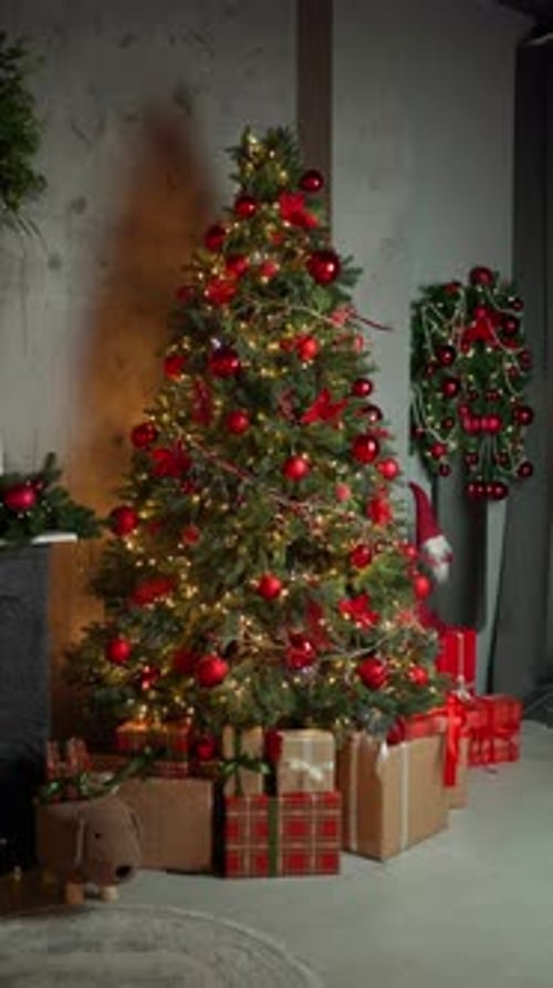 Decorated Christmas Tree with Presents and Red Ornaments