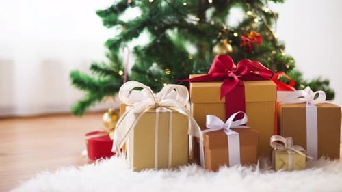 Christmas tree with presents underneath, holiday season