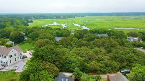 Scenic Aerial View of Cape Cod Home Overlooking Tidal Marshes