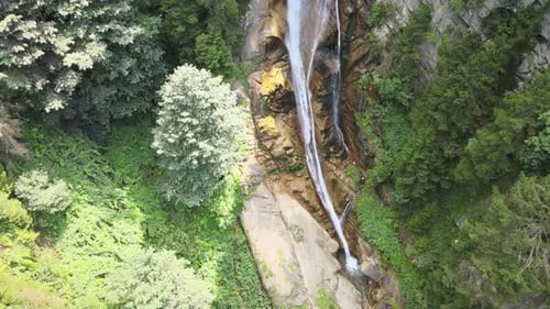 Lush Waterfall Cascading in Tropical Nature