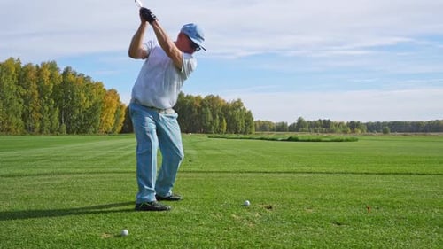Man Playing Golf on a Sunny Day