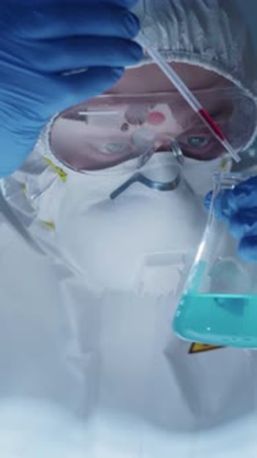 Medical Professional Performing Experiment in Lab