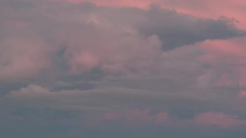 Pink and Grey Clouds in a Peaceful Sky