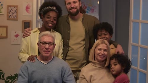Portrait of Intercultural Multi-generational Family Looking at Camera