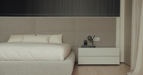 Comfortable Bed with Orthopedic Mattress in Bedroom with Modern Interior