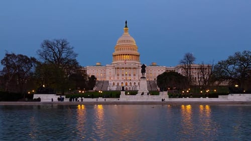 Majestic U S Capitol Building Reflecting in Water at Twilight Hour