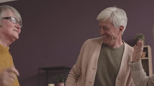 Happy Seniors Dancing at Nursing Home