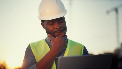 Medium Portrait of Highskilled Engineer with Laptop at Construction Site Innovation and Modern