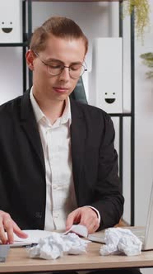 Businessman Writing at Table with Mistake Lack of Inspiration Crumples Sheet of Paper and Throw Away