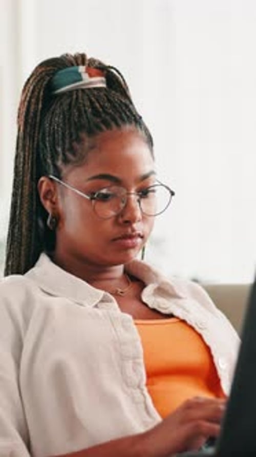 Woman Uses Laptop in Home Portrait Video
