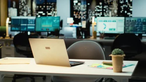 Empty Business Office at Night Showcasing Data Reports and Analytics