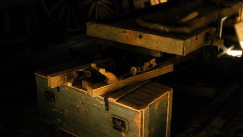 Vintage Woodworking Tools and a Workbench in a Rustic Workshop Setting