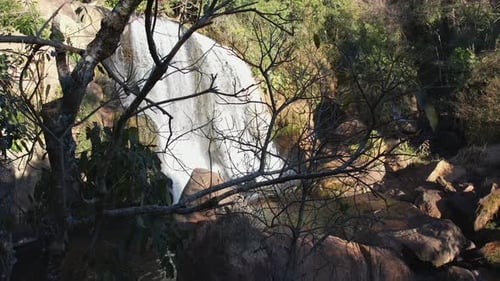 Beautiful Waterfall Cascading in Lush Natural Setting